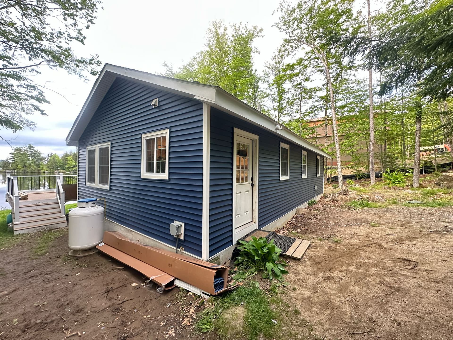 Vinyl siding on lakefront outbuilding, Massachusetts