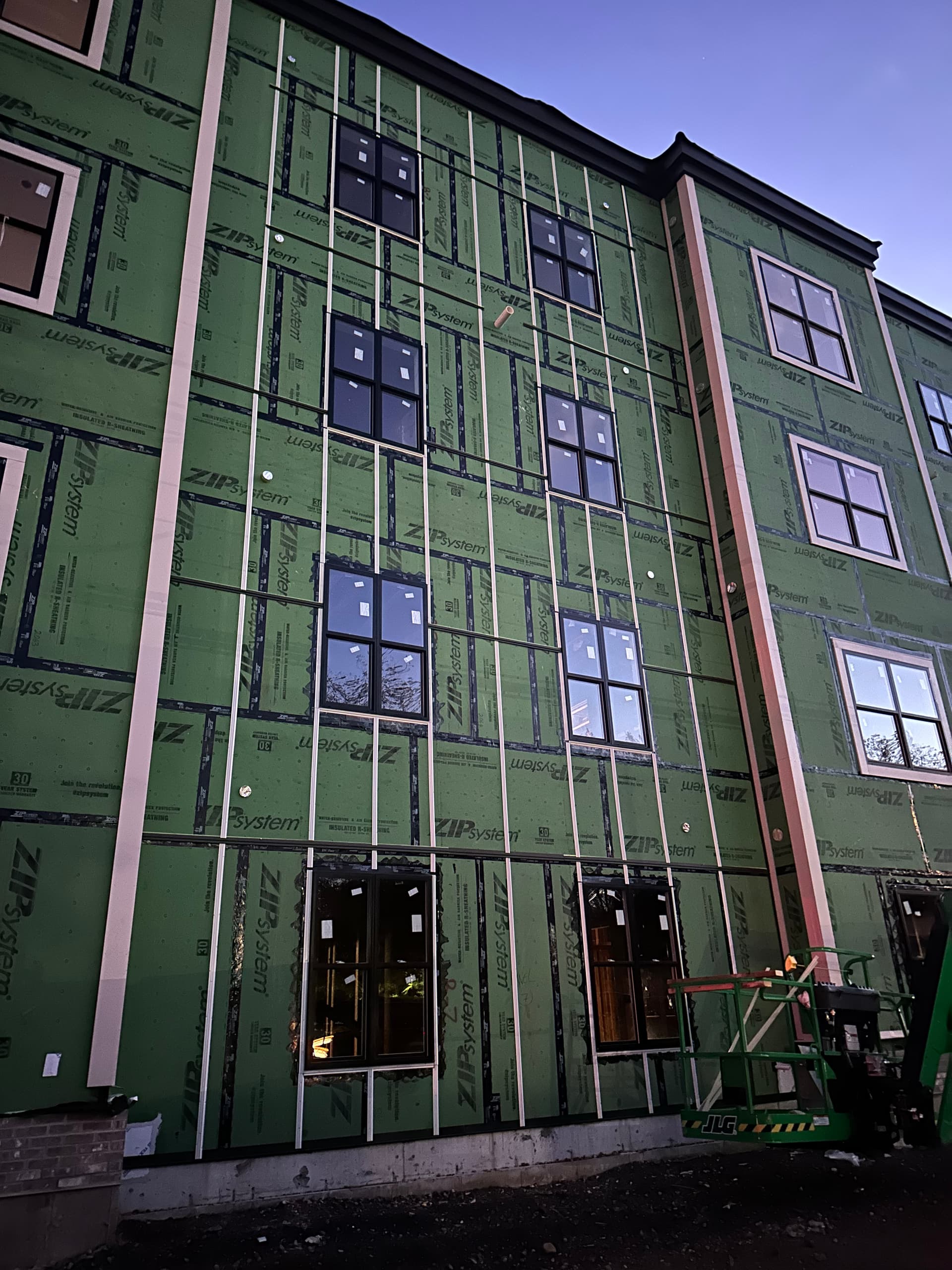 Close-up sheathing detail on commercial building by Wolf's Siding, MA