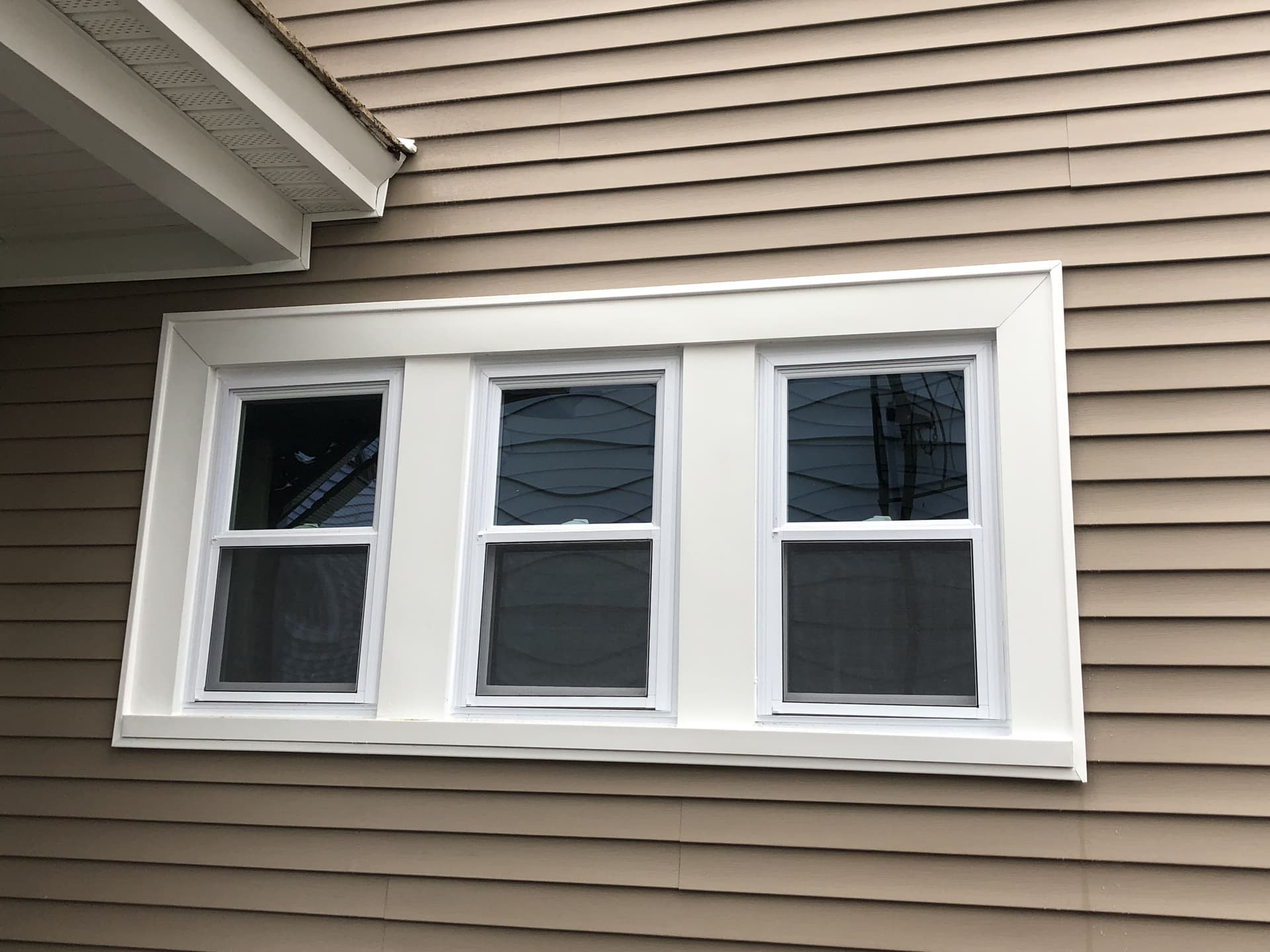 Window trim after full siding replacement by Wolf's Siding, MA